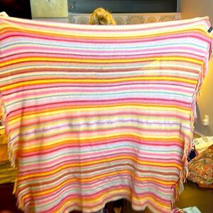 Smithsonian striped rainbow knit blanket